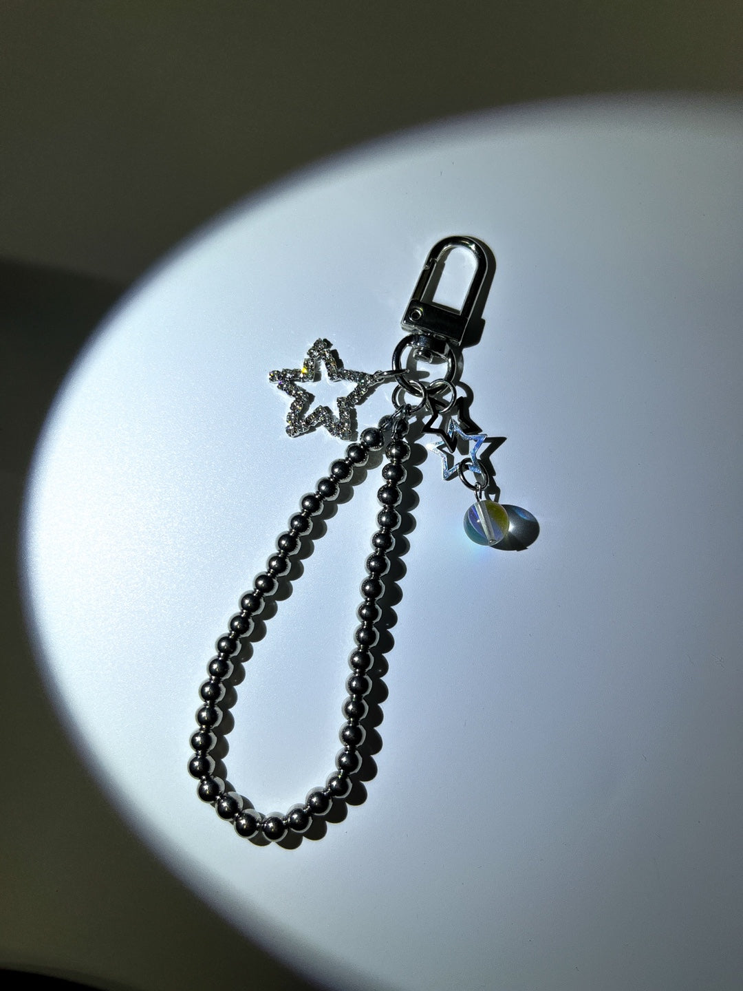 Silver star ball keychain