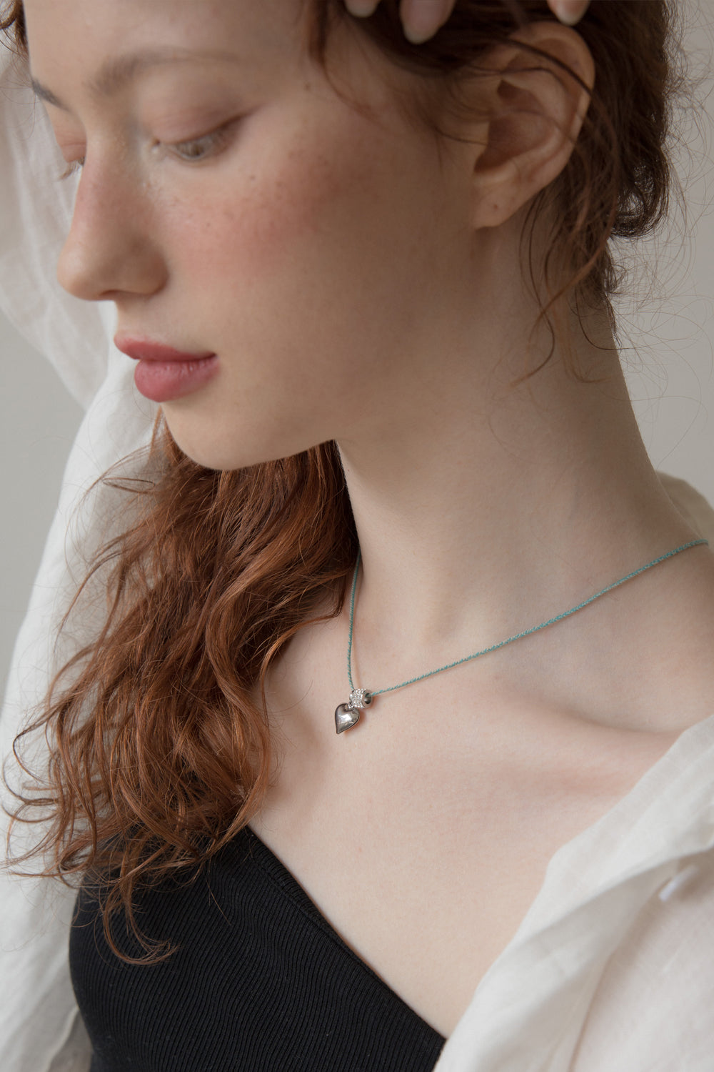 Heart point melange string necklace