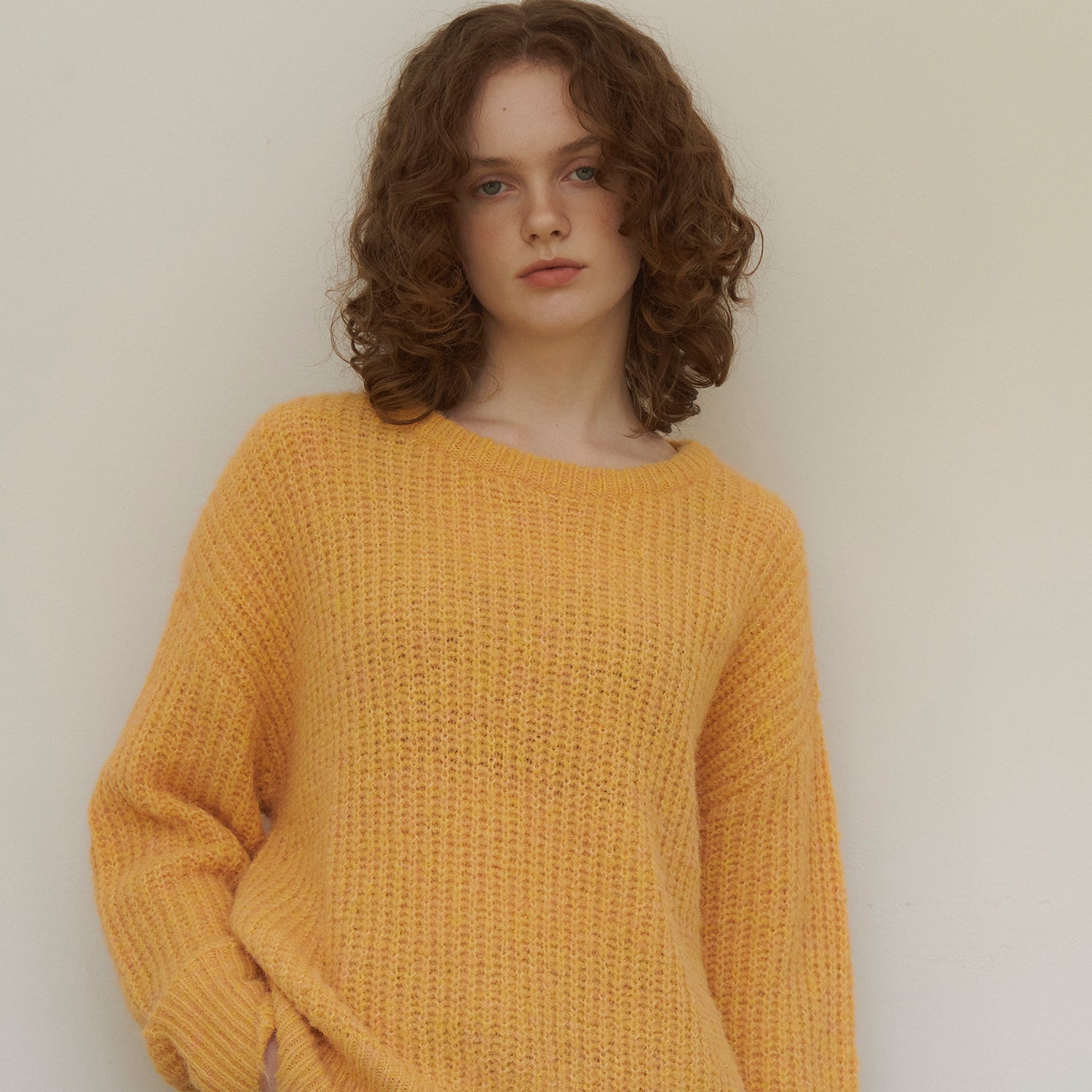 Touched round-neck wool knit