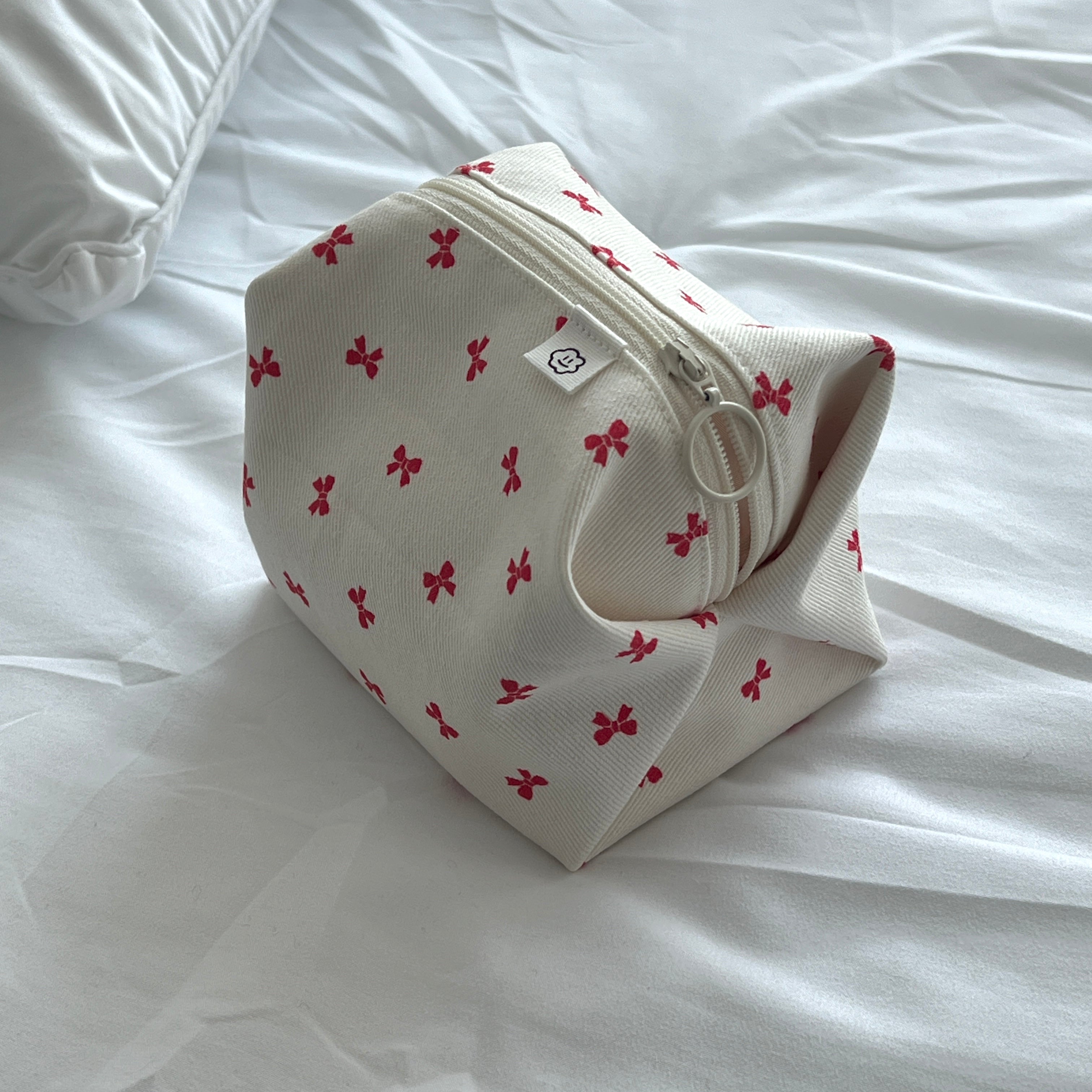 RED RIBBON ZIPPER POUCH