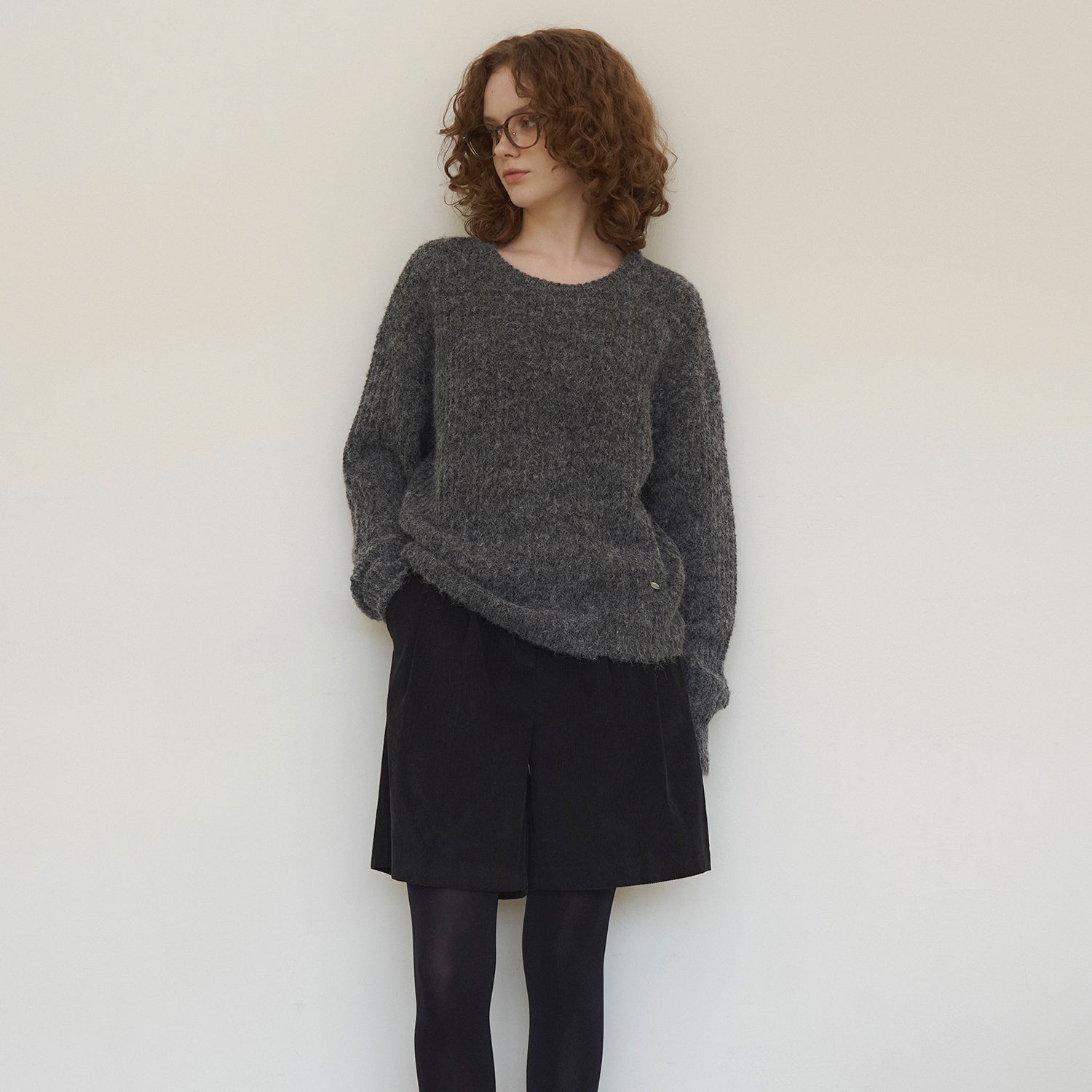 Touched round-neck wool knit