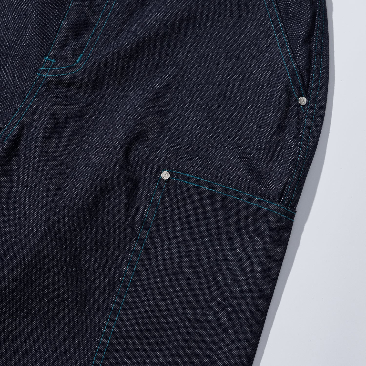 COLOR STITCH PANEL DENIM PANTS - INDIGO