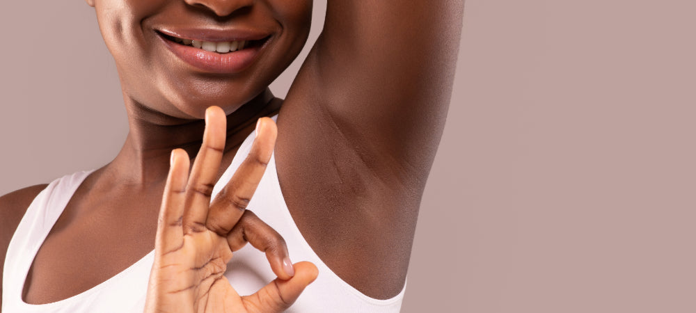 A woman with smooth underarms after shaving