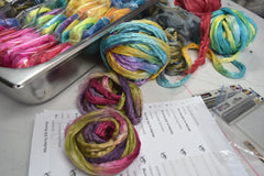 hand dyed mulberry silk fibres being packed by sally ridgway | Sally Ridgway | Shop Wool, Felt and Fibre Online