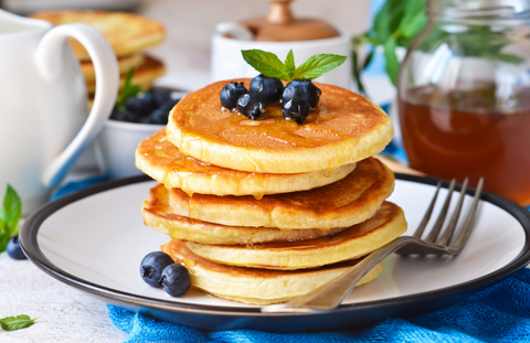 Pancakes with blueberry on top