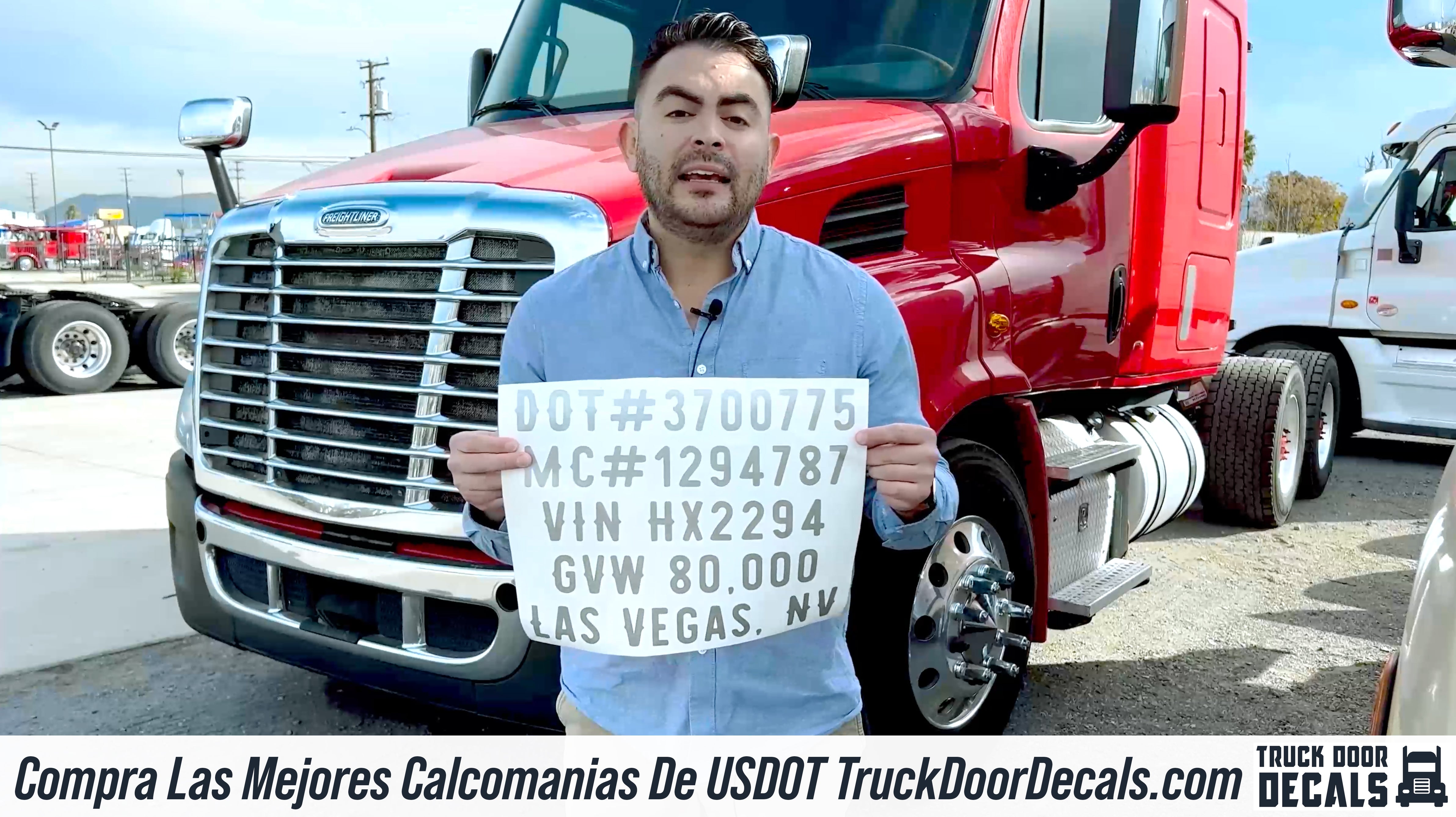 man holding usdot truck decal sign