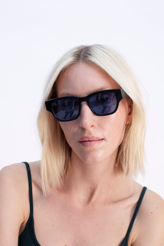 Ella wearing prism smr days collaboration sunglasses 