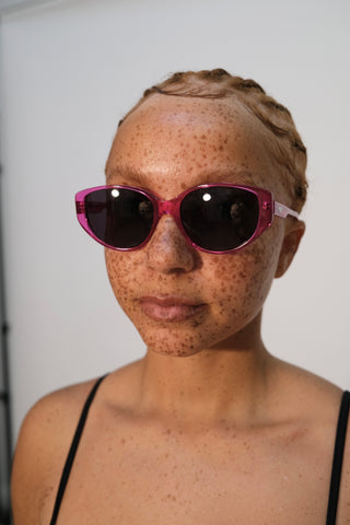 model wearing prism sierra pink sunglasses