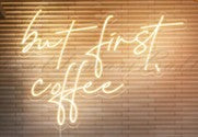 yellow neon but first coffee sign