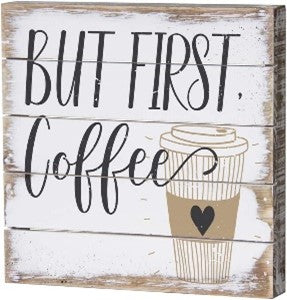 rustic style but first coffee sign with one white paper cup 