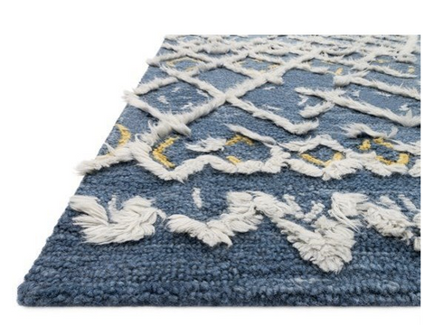 close up of blue handmade modern rug