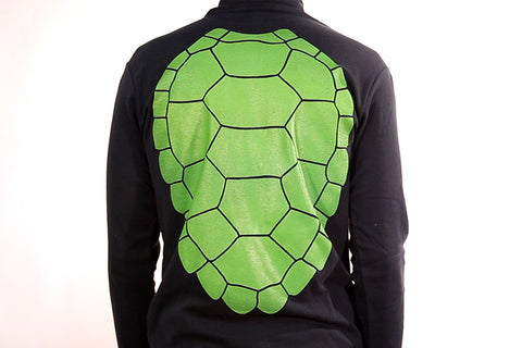 Black turtleneck with green cartoon-style turtle shell printed on the back