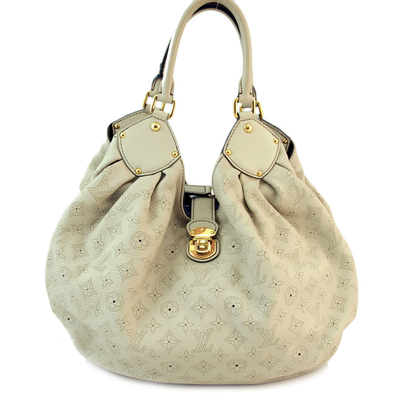 where is the date code on louis vuitton mahina xl