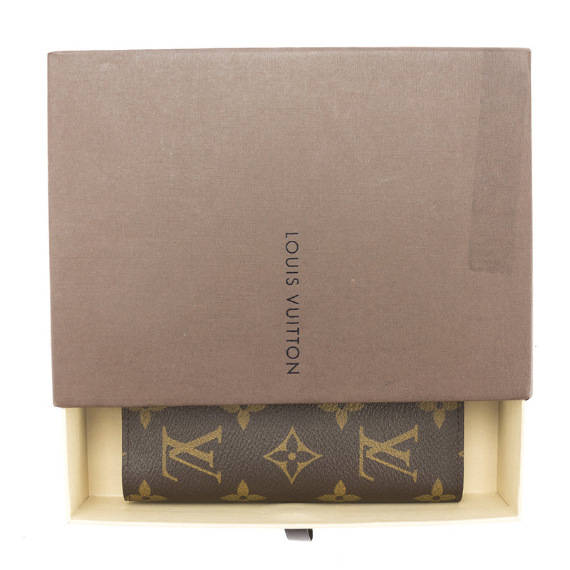 Louis Vuitton Monogram Couverture Passport Cover (Pre Owned) – LuxeDH