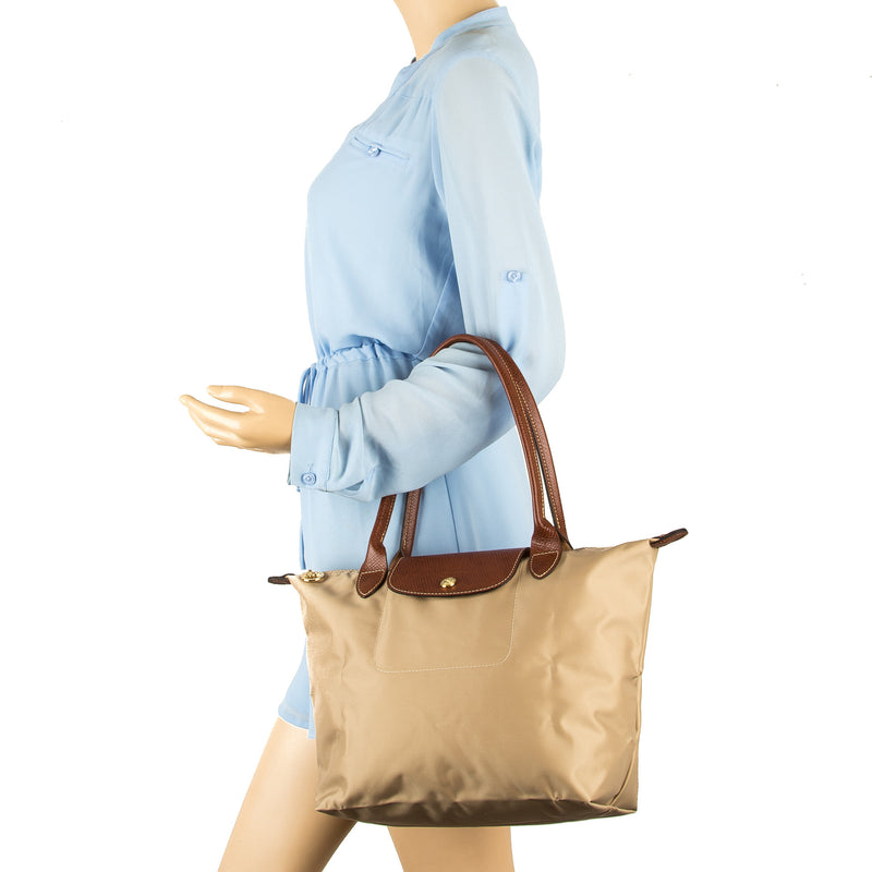 beige longchamp bag