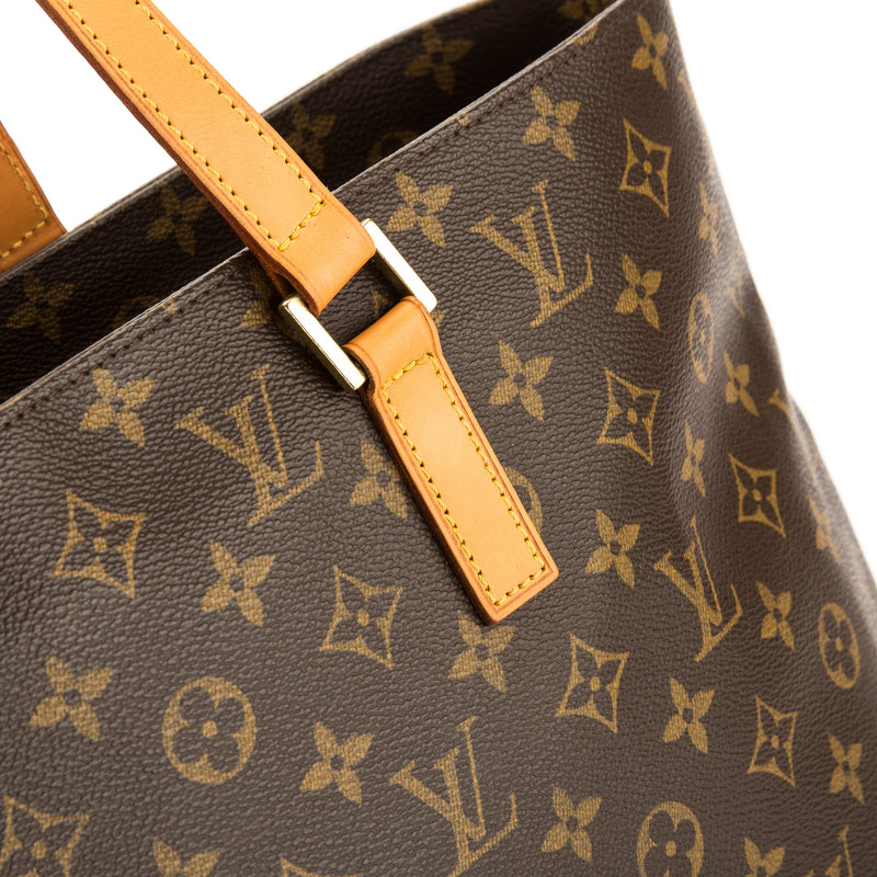 Louis Vuitton Luco in monogram canvas and natural leather