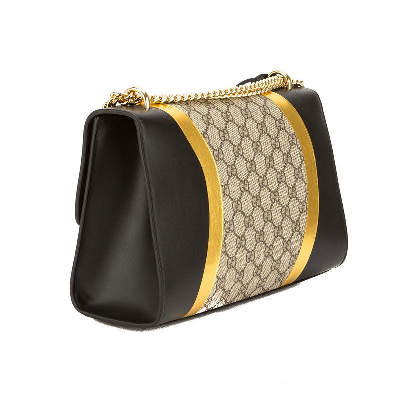 black and gold gucci purse