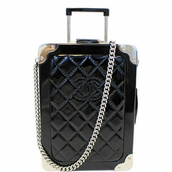 black quilted suitcase