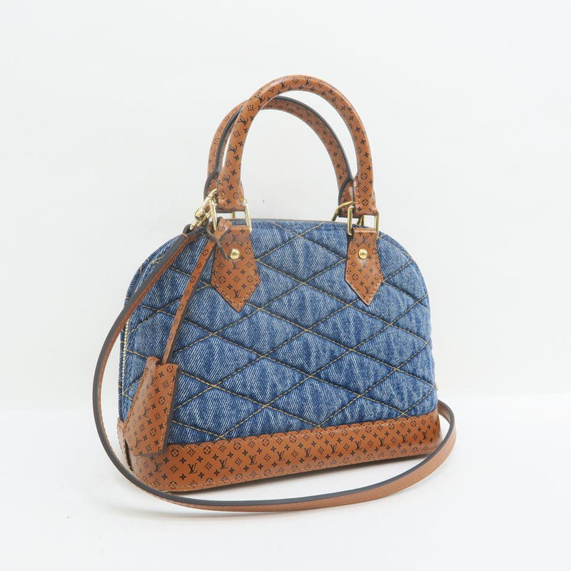 Louis Vuitton Alma Bb Timeless Dark Denim Canvas Satchel – LuxeDH