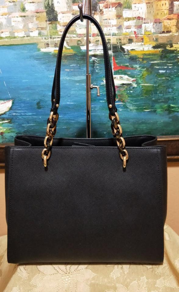 black mk purse with gold chain