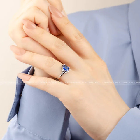 Oval Royal Blue Sapphire and Diamond Three Stone Ring