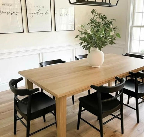 Light Wood Table with Black Chairs