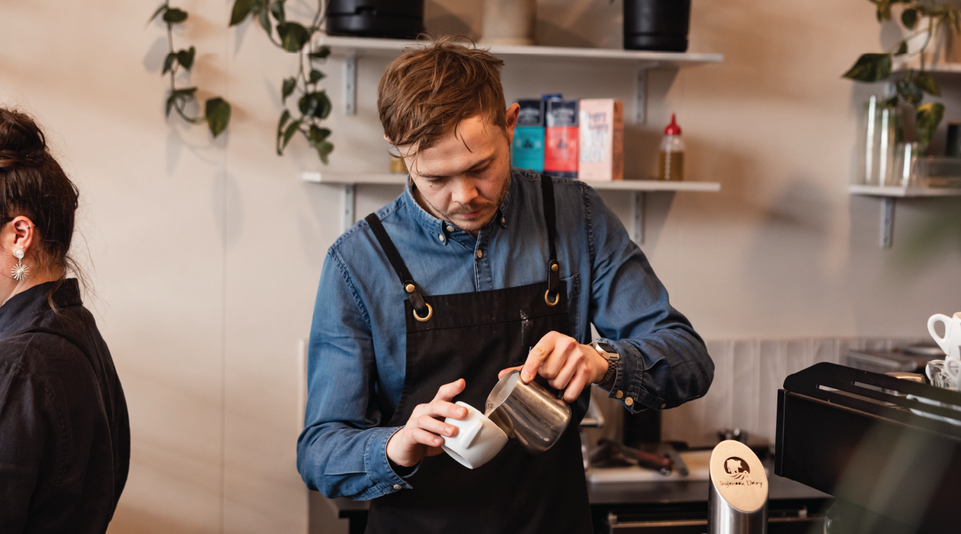 The friendly team at Cobbs Coffee Ballarat, making coffees.