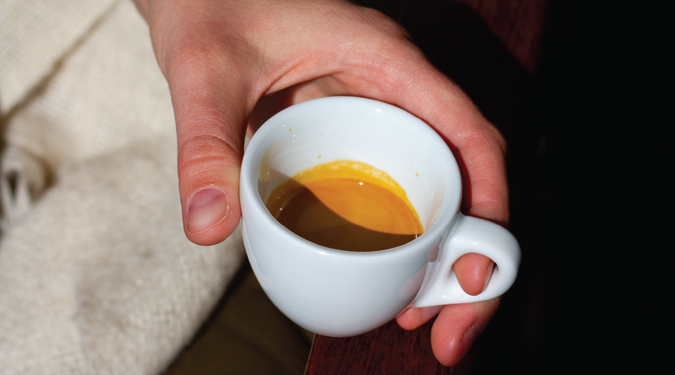 shot of espresso shot in coffee cup