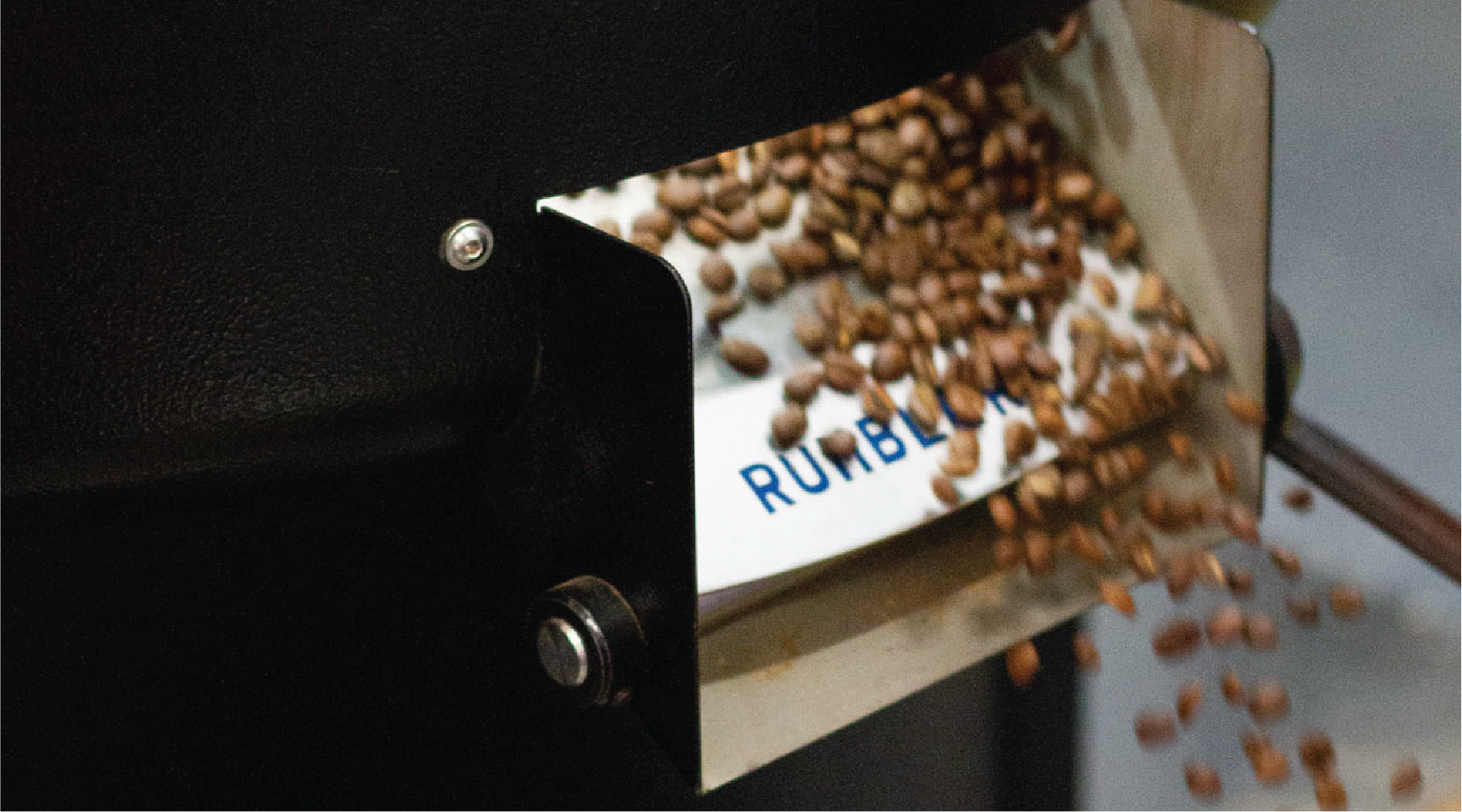 Roasting coffee through a Probat roaster at Rumble Coffee Roasters