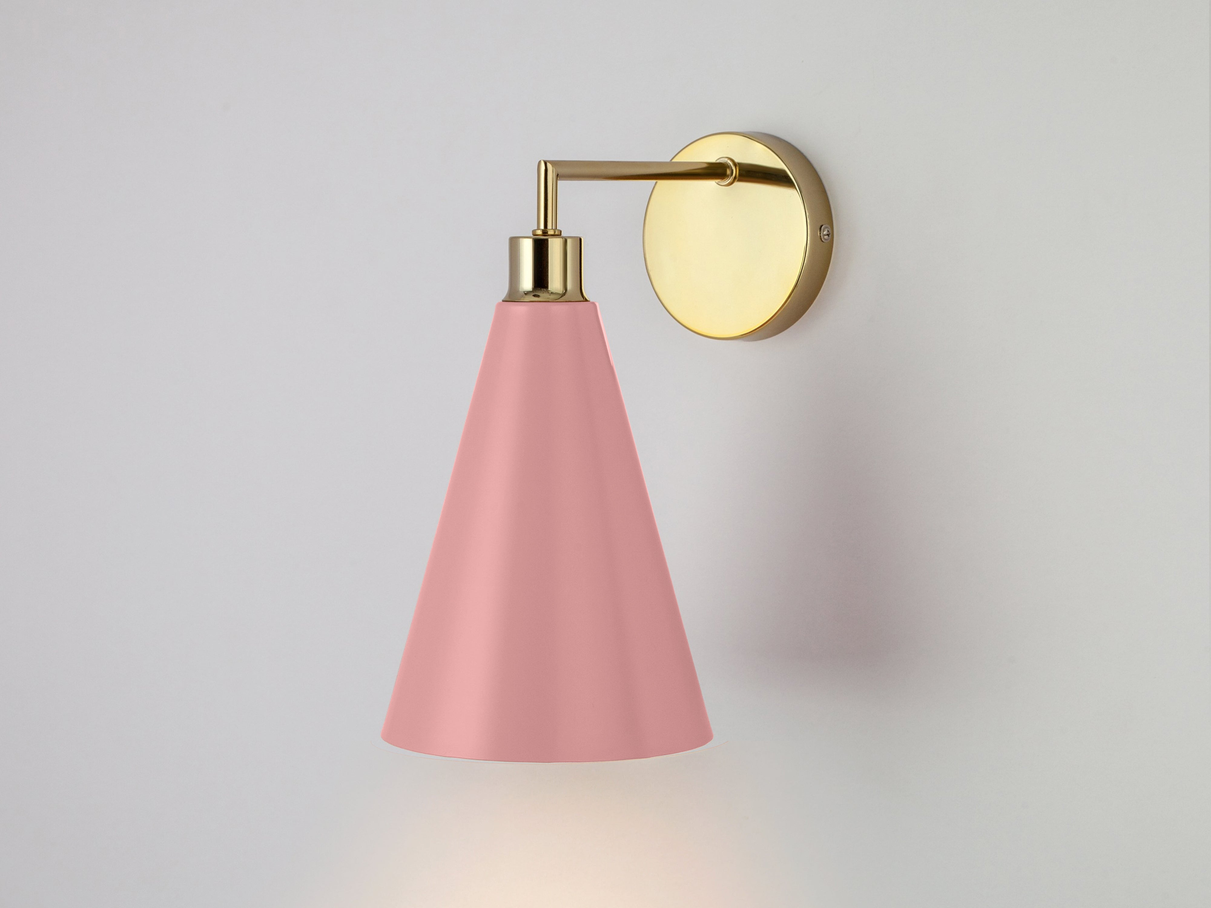 Pink cone shade wall light