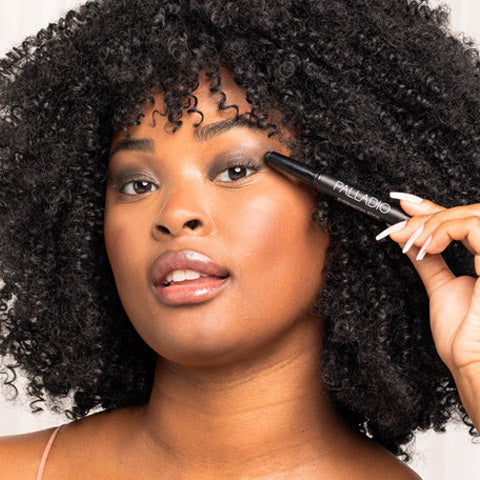 African American Model wearing Matte Black Eyeshadow Stick