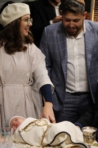 The author and her husband with their first child