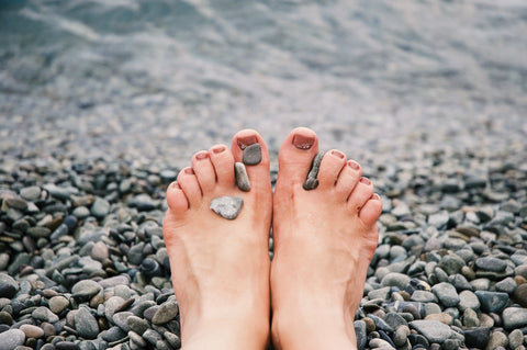 Image source: https://www.pexels.com/photo/stones-on-woman-s-feet-1274061/