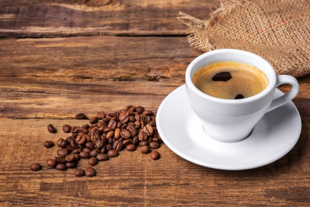 Økologisk kaffe Billedet viser en kop kaffe på et bord