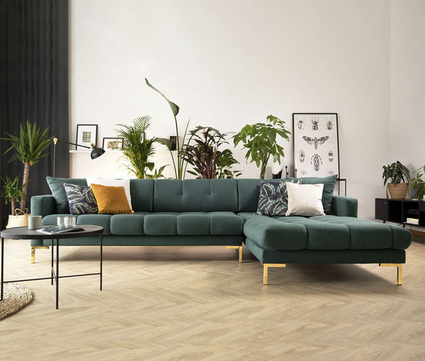 zielona sofa pikowana do salonu