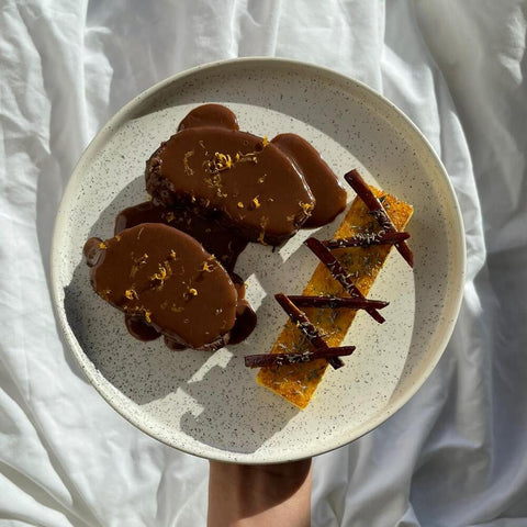 Rôti de sanglier au Byrrh, chocolat, clémentine et Polenta. 