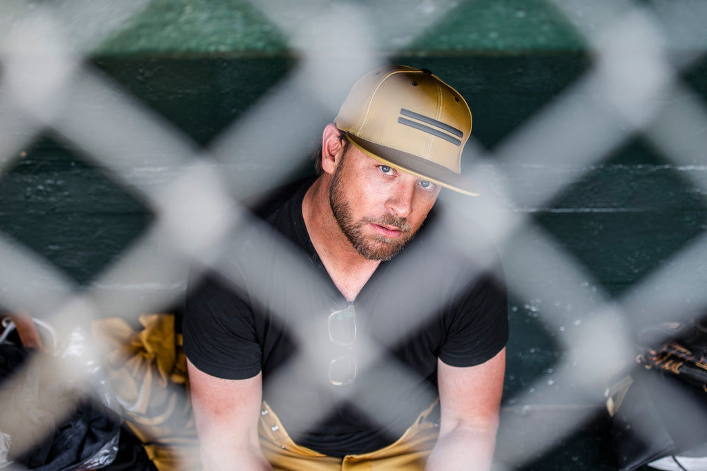 Warstic Owner & Founder Ben Jenkins in the dugout pre-game