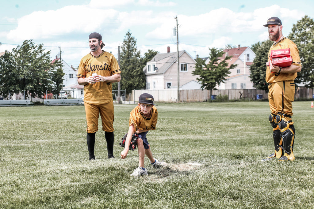 Warstic Woodmen's bat boy throwing some pitches after the game