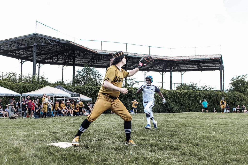 Jack White of the Warstic Woodmen making a play at first