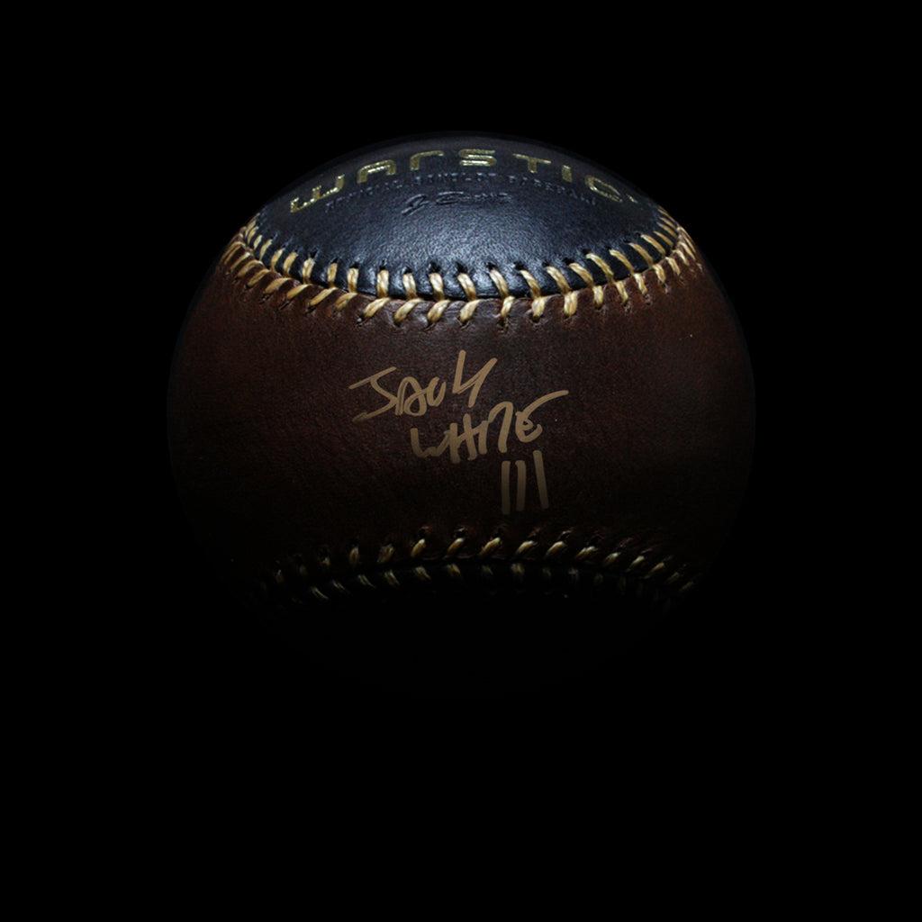 Black and brown leather baseball autographed in gold by Jack White.