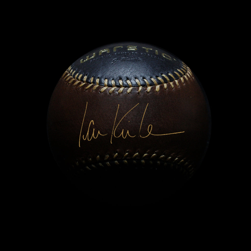 Black and brown leather baseball autographed by Ian Kinsler in gold.