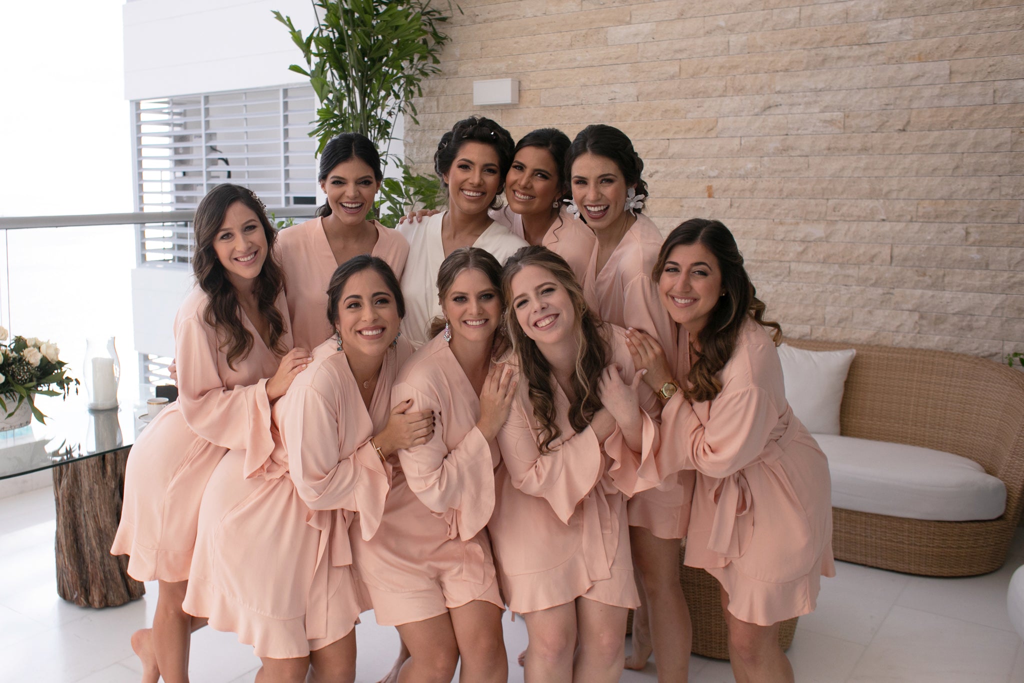 The bride with her bridesmaids in their sustainably made Ruffle Robes by Half Asleep