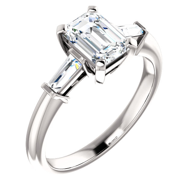 round diamond with emerald cut side stones