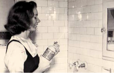 woman holding aerosol