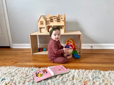 infant with floor shelf