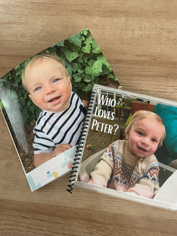 two photo books showing a little boy with the title, "who loves peter?"