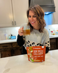 Tina enjoying a cup of warm Vitauthority Chicken Soup Flavored Bone Broth Collagen