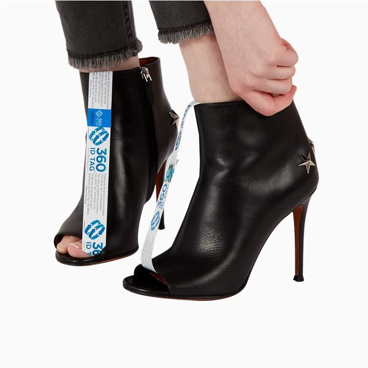 Boots with e-commerce return tag to prevent return fraud like wardrobing, wear and return, counterfeit product switches. 360 ID Tag