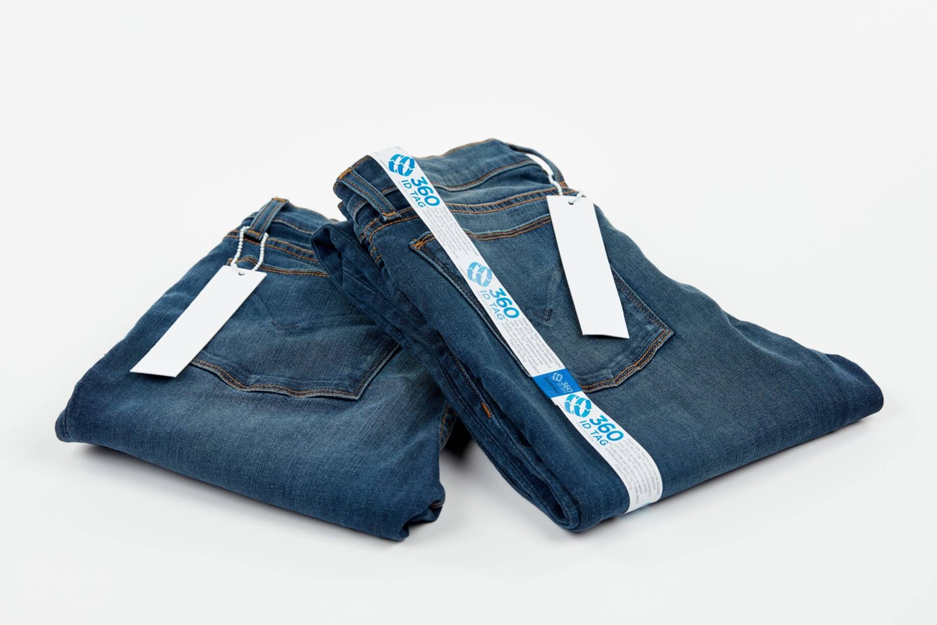 Jeans with e-commerce return tag to prevent return fraud like wardrobing, wear and return, counterfeit product switches. 360 ID Tag