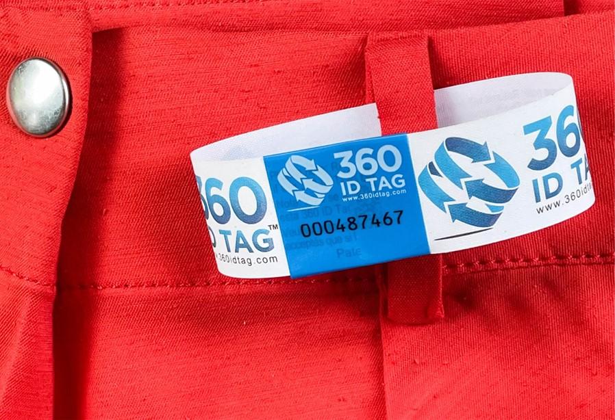 Pants with e-commerce return tag to prevent return fraud like wardrobing, wear and return, counterfeit product switches. 360 ID Tag